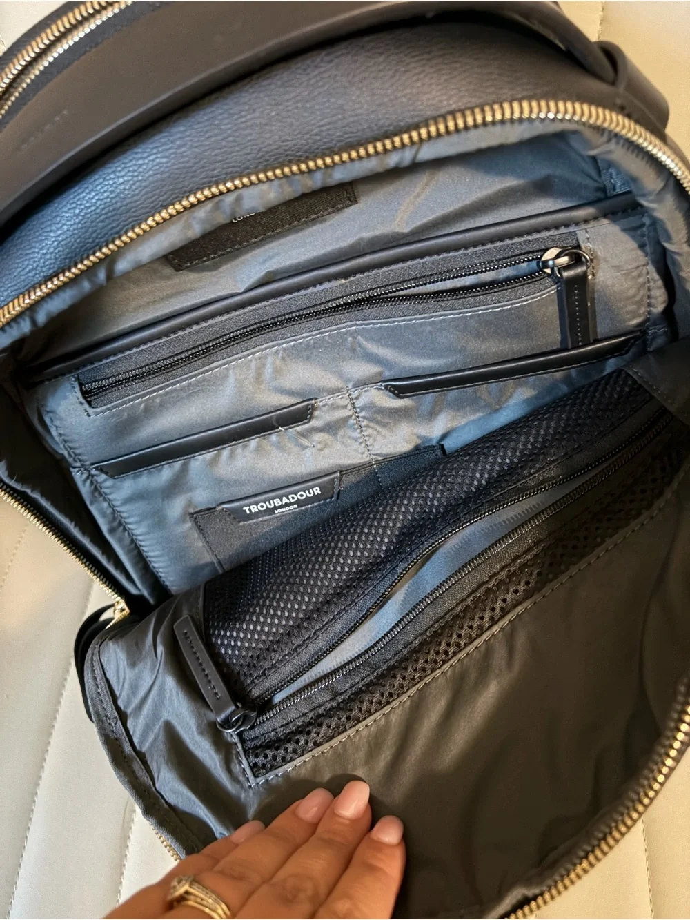 Sophisticated Black Women's Backpack with Gold Hardware